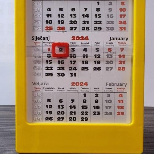Kalendar stolni pomični 12x16 DP sivi